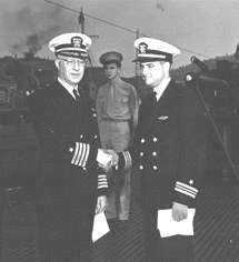 Capt. McCain accepting the boat from EB Co.